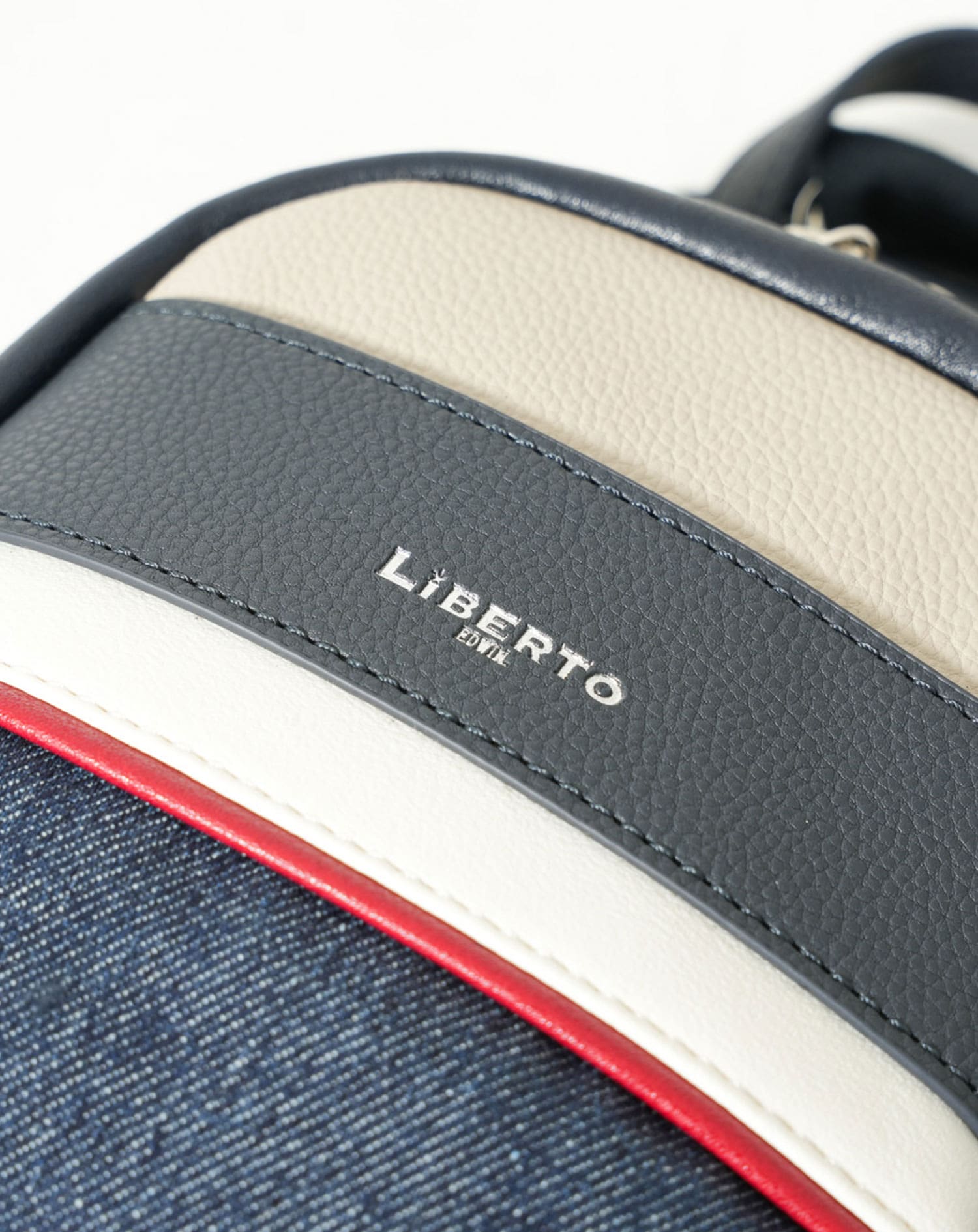 リベルトエドウィン(LiBERTO EDWIN)デニム×PUレザー切り替えボディ