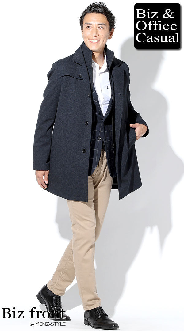 チェスターコートとチェック柄ジャケットを重ねた冬の防シワビジネスコーデ