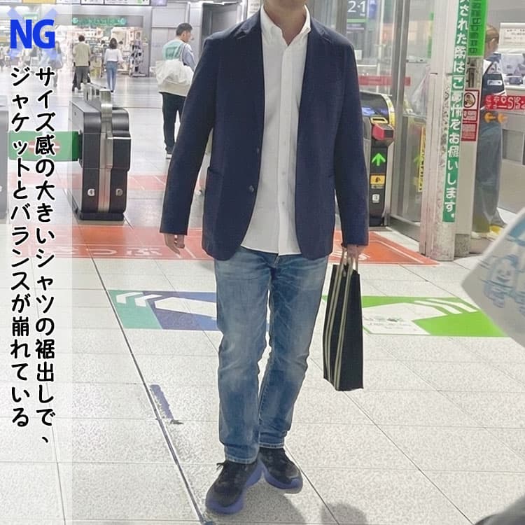 春のジャケットのインナーにシャツの裾出しで春のジャケットとバランスが崩れている男性例