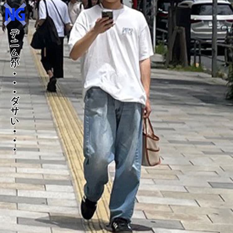 ダサいデニムを着た男性