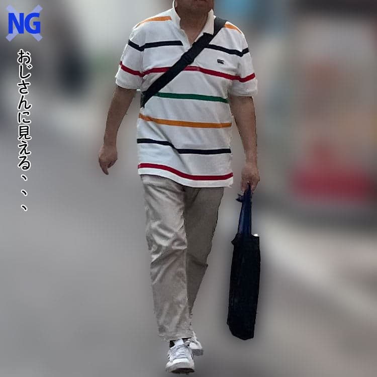 身幅が太過ぎ、着丈が長過ぎるポロシャツでだらしなく見えるポロシャツを着た50代男性例